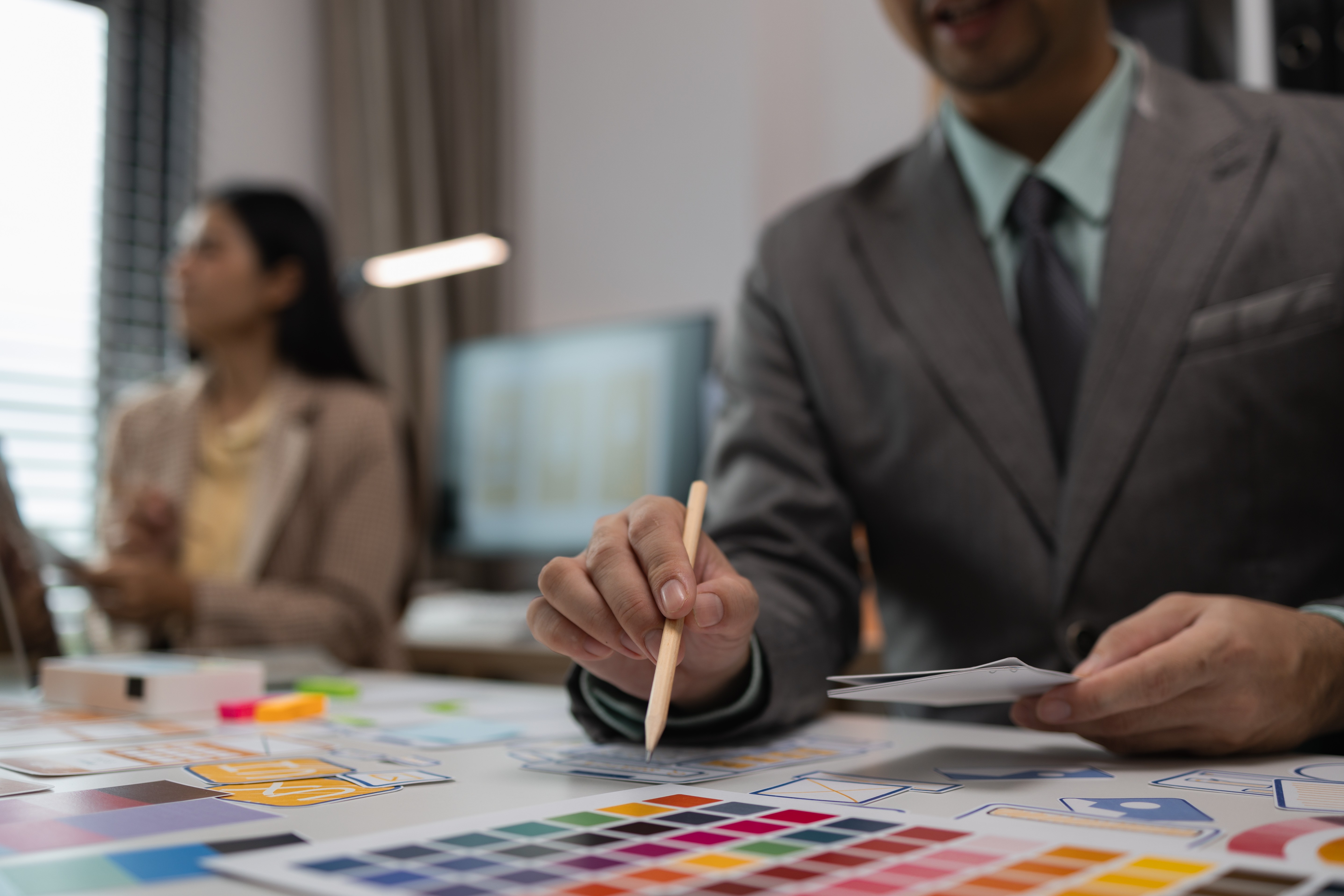 A blurred executive portrait with a pencil